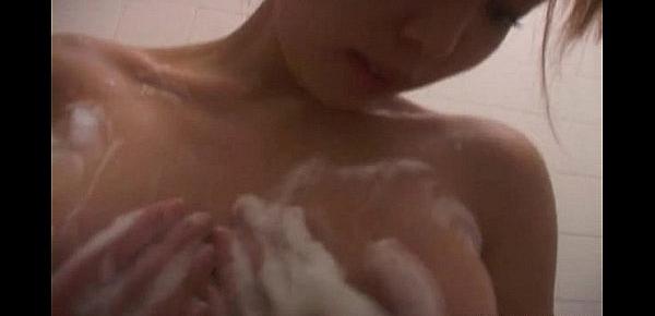  Very cute Asian babe in the shower gets sensual